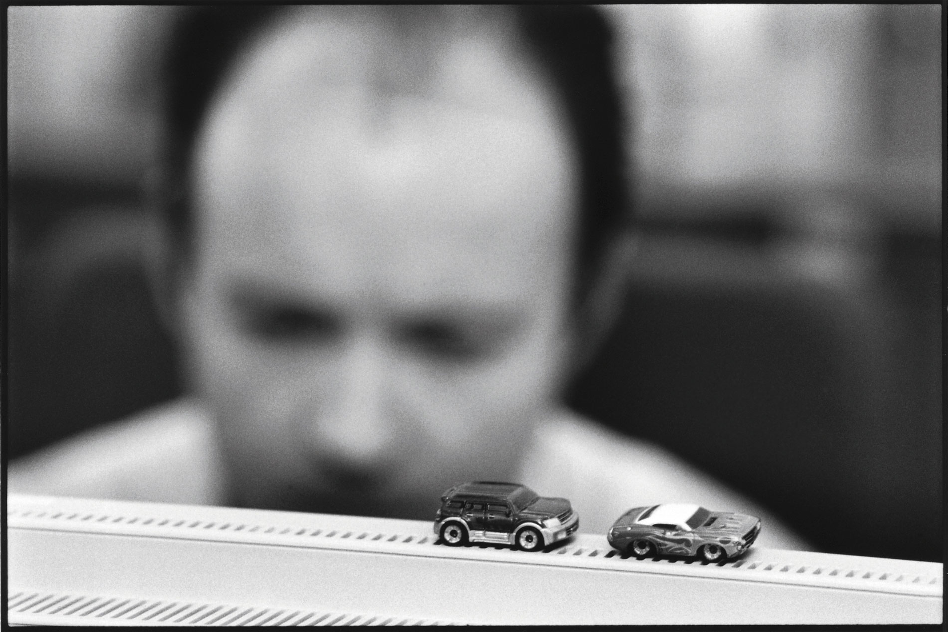 Trader with his mini-cars, Paris, 2005