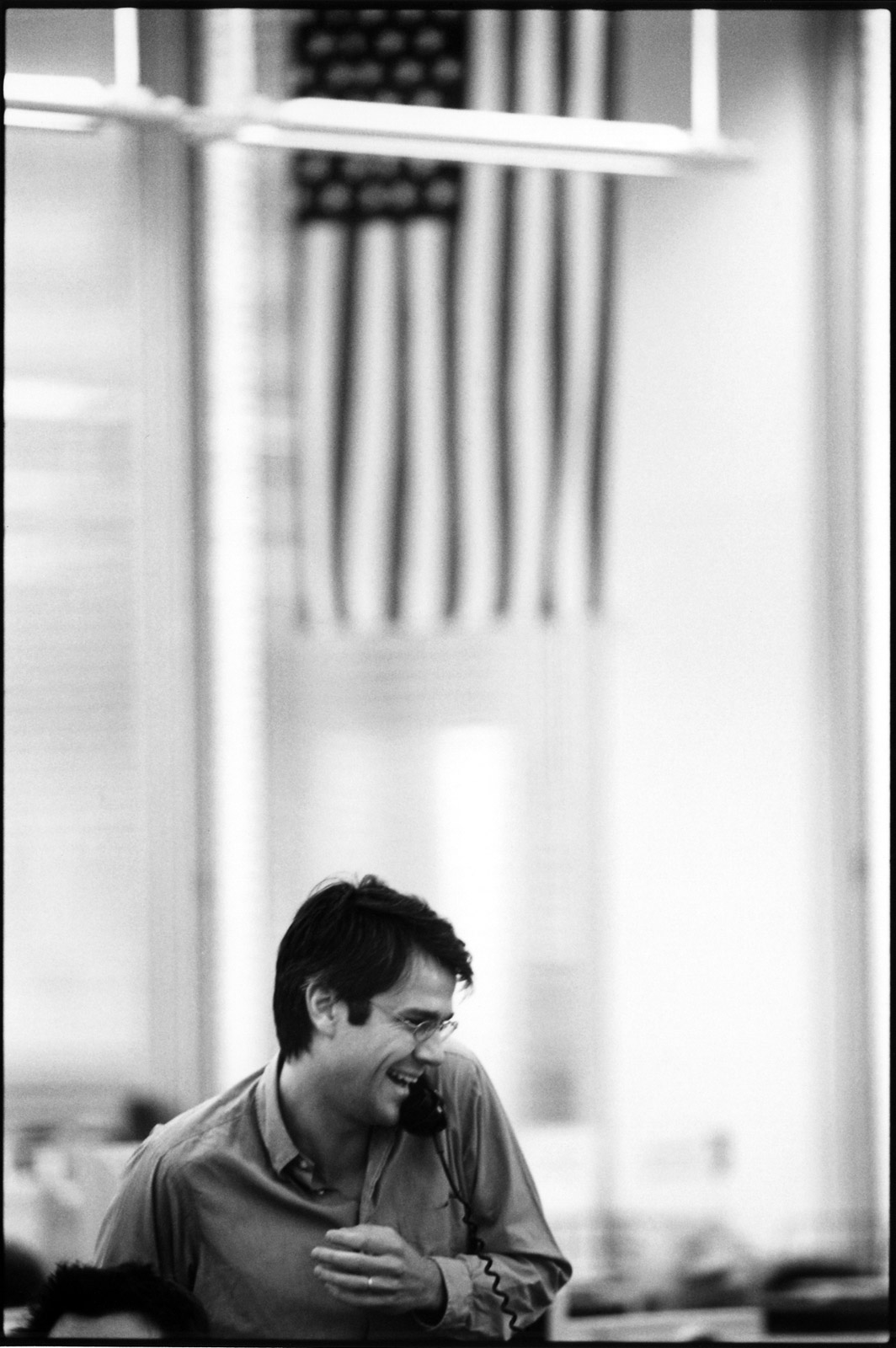 Trader with the American flag, London, 2005