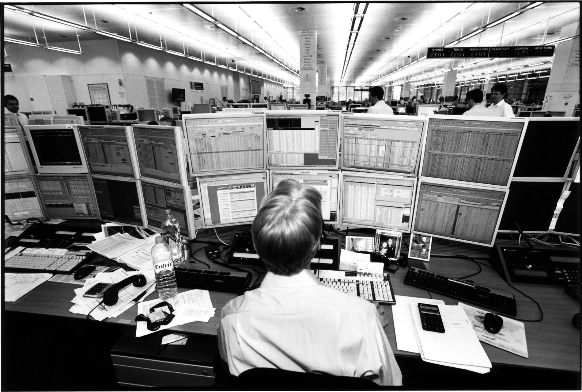 Trader in front of 16 screens, London, 2005